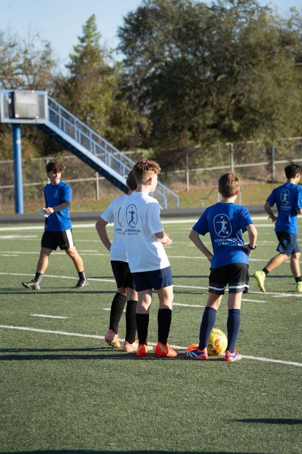 Young players training together at Futebol Soccer Academy